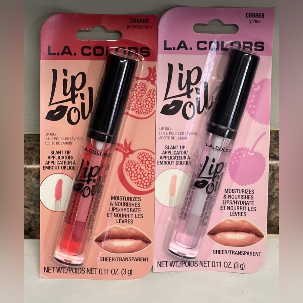 L.A. Colors Lip Oil - Pomegranate/ lychee. Sheer transparent.